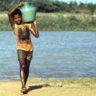 Boy carrying water