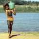 Boy carrying water Boy carrying water