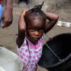 A child during the rainy season in West Africa