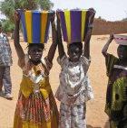 Children carrying water in Mali