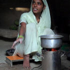 A woman with a clean cooking stove
