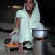 A woman with a clean cooking stove