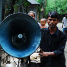 Cyclist with megaphone, Bangladesh Cyclist with megaphone, Bangladesh