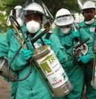 Tanzanian sprayers going house-to-house on Zanzibar Island