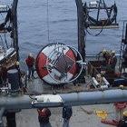 Lauching a deep ocean buoy to detect tsunamis