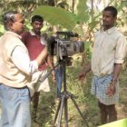A farmer is filmed doing a demonstration in Karnataka