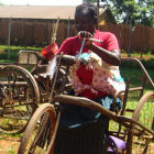 Disabled person using wheelchair in Uganda