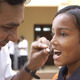 Doctor giving child a tablet