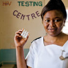 Nurse holding antiretroviral pills, Zimbabwe