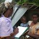 Health worker conducting survey in Mozambique