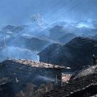 Smoke from wood fires rising from houses in Gatlang Village, Nepal.