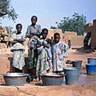 Children collecting water in Mali