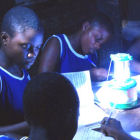 Students working  under light