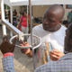 Two Africans at a 'maker fair' in Ghana