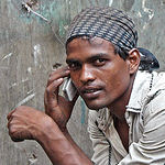 A man talks on a mobile phone/India
