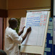 Taking notes at meeting in Nairobi, Kenya