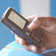 African woman holding phone