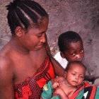 Malaria vaccine trial, Idete village. A mother waits to present her child for vaccination with the third and final dose of the SPf66 vaccine which is being tested in African conditions for the first t