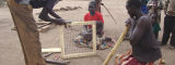 Building a nut shelling device in Uganda - Flickr/uusc4all Building a nut shelling device in Uganda - Flickr/uusc4all