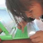 A girl with an XO laptop in Peru