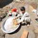 Girl standing in floodwaters