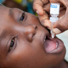 Child receiving oral polio vaccine in Kano, Nigeria
