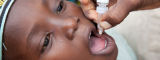 Child receiving oral polio vaccine in Kano, Nigeria by Flickr/Gates Foundation