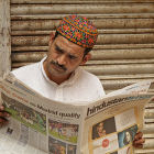 A man reading a newspaper
