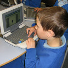 Schoolchildren using Classmate machines