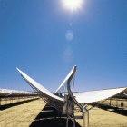 Parabolic mirrors reflect and concentrate solar energy in thermal power plants