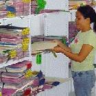 woman looking at books