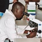 Ugandan scientist researching HIV/AIDS