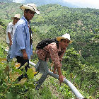 Men working on a water pipeline in Honduras