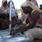 Women installing solar panels