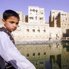 A young boy by a cistern in Yemen