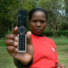 Woman displaying mobile phone