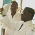 Surgeons studying an x-ray film in Ghana