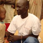 African journalist interviewing children