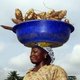 Woman carrying cassava