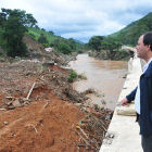 Secretary of State for Social Assistance and Human Rights, Rodrigo Nerves, surveys the flood damage