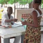 A patient is given TB drugs in Cotonou, Benin