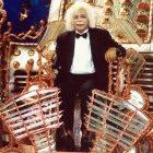 An actor depicting Einstein in a time machine