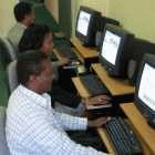 The report advocates for communication within communities, such as this Internet facility at the AIDS Resource Center (ARC), Ethiopia