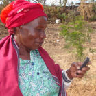 A woman holding a mobile phone