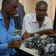 African inventors with their robots