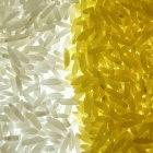 Golden rice (right) produces more beta-carotene than white rice (left) does.