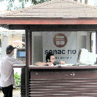 Men using an Internet kiosk in Brazil