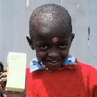 Kenyan child with antiretroviral drugs