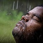 Man standing in monsoon