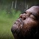 Man standing in monsoon